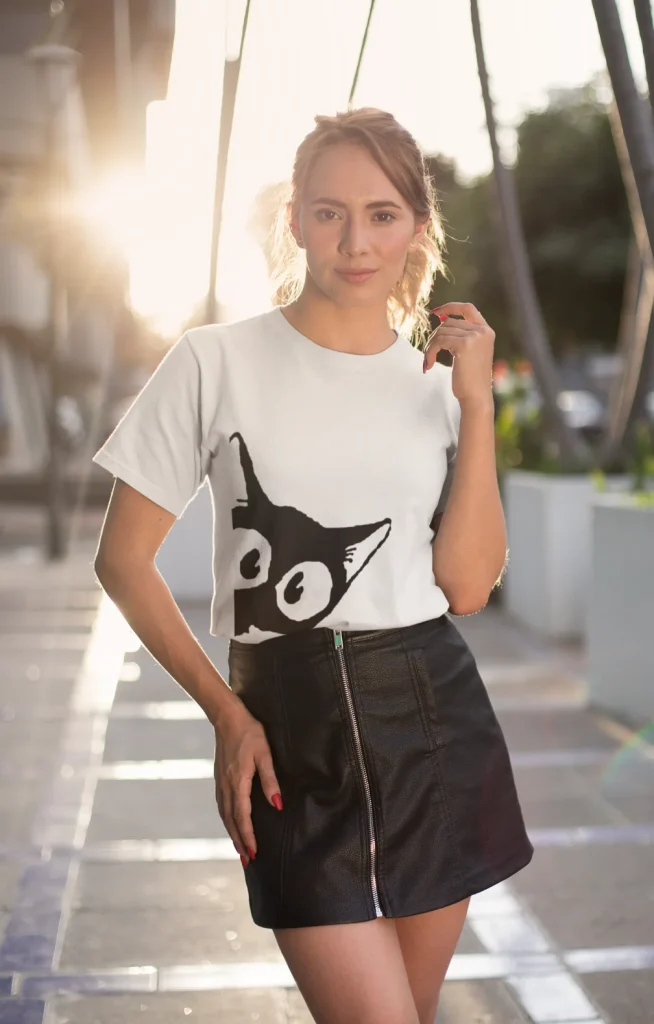 model wearing white t-shirt with black cat fun design